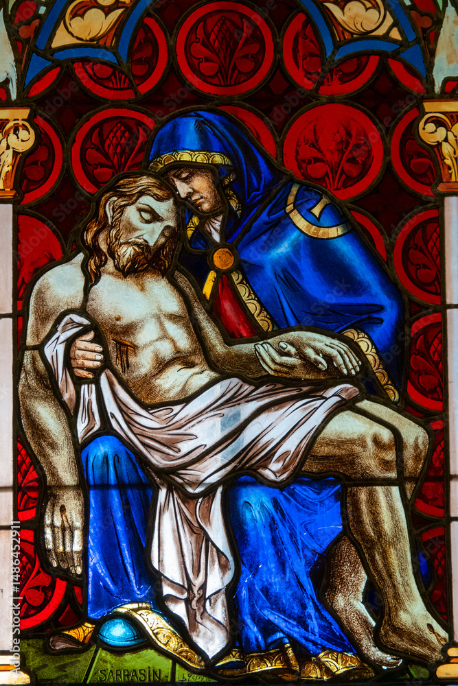 Fototapeta premium Stained glass (1939) of The Pietà.