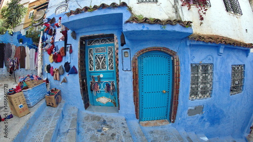 Blue door with an arched top in the medina, in Chefchaouen, Morocco, taken with a fisheye lens