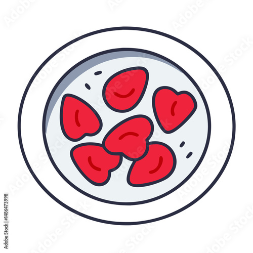 Plate of heart-shaped red candies on a white dish  