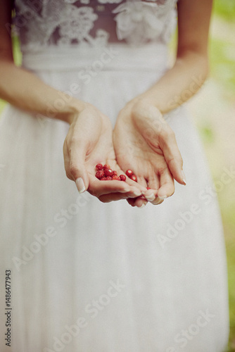 woman holding wild strawberries, book illiustration, book cover