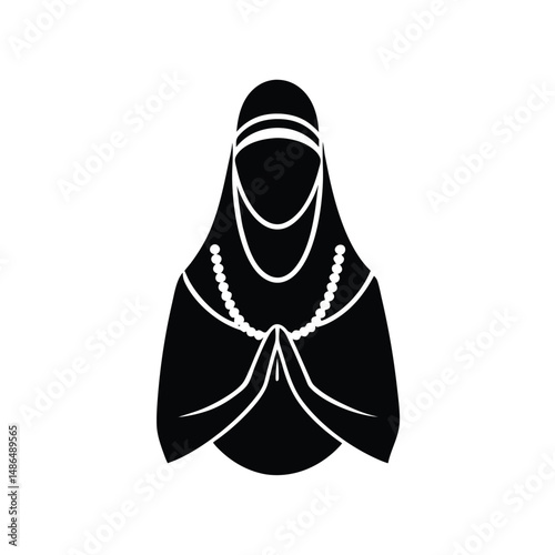 Muslim woman praying wearing niqab beads