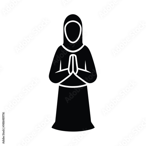 Muslim woman praying in hijab islamic faith