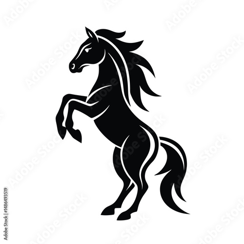 Majestic black stallion rearing up powerful horse