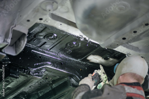treatment of the car body bottom with anti-corrosion compound