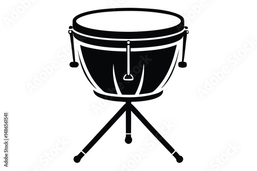 The stark black timpani stands tall on a tripod, awaiting the orchestra's dramatic percussion