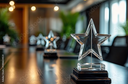 Clear star-shaped awards on a conference table