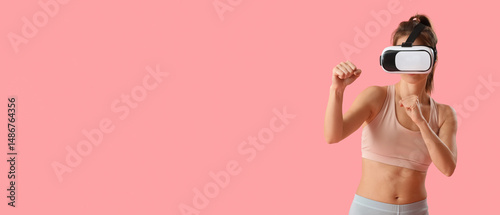 Sporty young woman in VR gl...