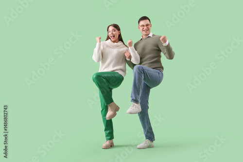 Happy young couple in warm ...