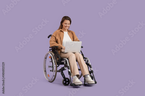 Young woman in wheelchair u...