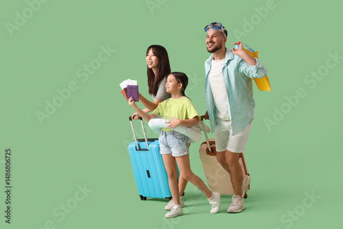 Happy parents with their da...
