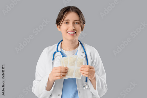 Female doctor with mustard ...