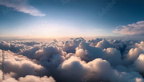 Aerial view of fluffy clouds under a clear blue sky during the daytime scene