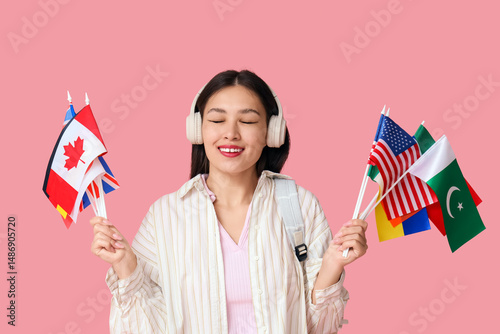 Young Asian woman with flag...