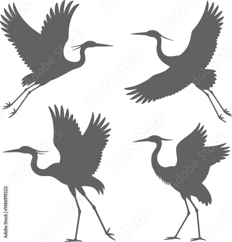 Elegant grey heron silhouettes flying gracefully