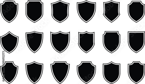 Collection of shield icons in black and white with various decorative edges for design concepts