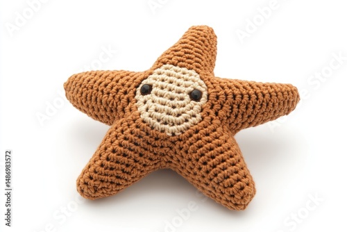Cute, crocheted starfish toy with a light-brown face