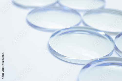 Eyeglasses lens production industry, close-up eyeglasses lenses, glasses lenses, eyeglasses lenses, eyeglasses store business concept