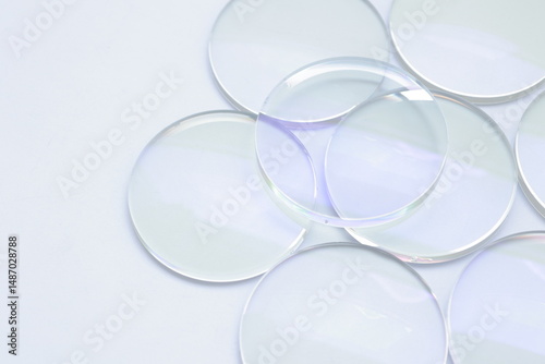 Eyeglasses lens production industry, close-up eyeglasses lenses, glasses lenses, eyeglasses lenses, eyeglasses store business concept