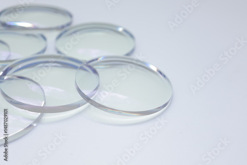 Eyeglasses lens production industry, close-up eyeglasses lenses, Glasses lenses, eyeglass lenses, eyeglasses store business concept, healthy eye care