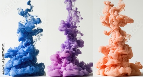 Abstract ink cloud formations in three pastel colors