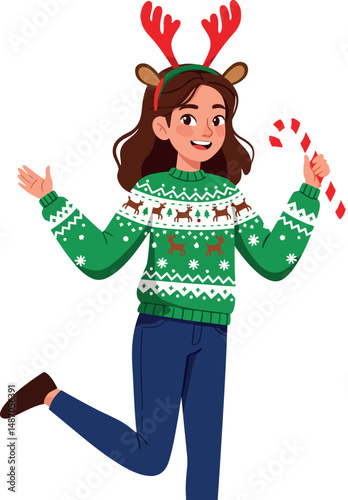 Girl wearing green festive sweater and reindeer antlers holding candy cane for Christmas celebration 