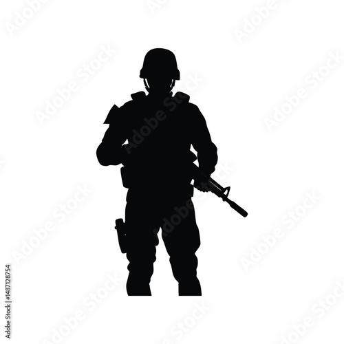 Silhouette of a soldier armed and ready in a military uniform and helmet