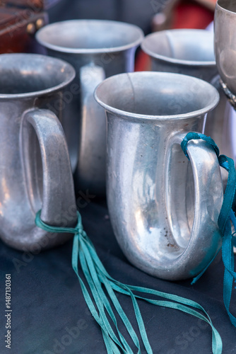 Antique metal cups