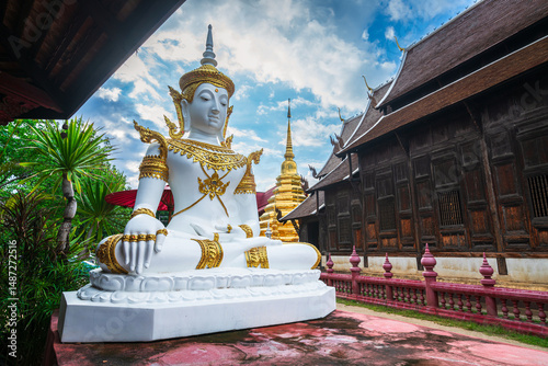 Beautiful Ancient golden color Pagoda in the Phan Tao temple  is a Buddhist temple in the historic centre tourist attraction an ancient Thai art and is Public places in Chiang Mai,Thailand.