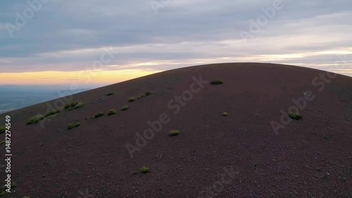 Serene Volcanic Hill Drone Shot in Cinematic Afternoon Light

