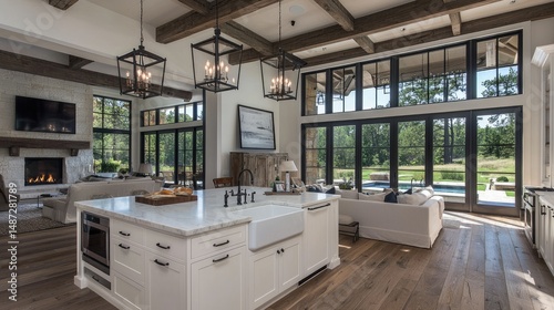 A luxury modern home interior featuring a kitchen and living area