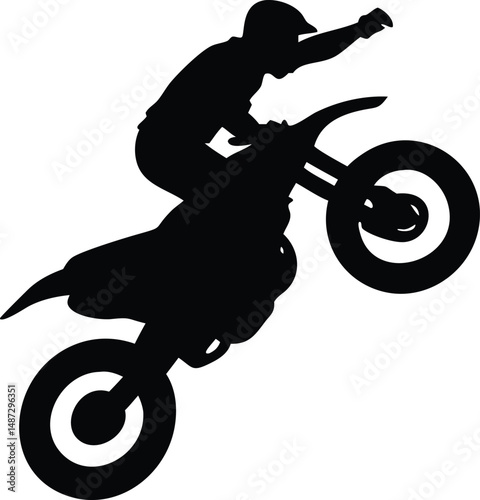 Silhouette depicts the daring motorcyclist executing a wheelie stunt on a modern bike
