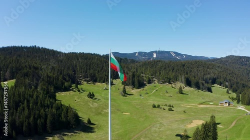 Aerial footage of the national flag of Bulgaria waving on the highest pole photo