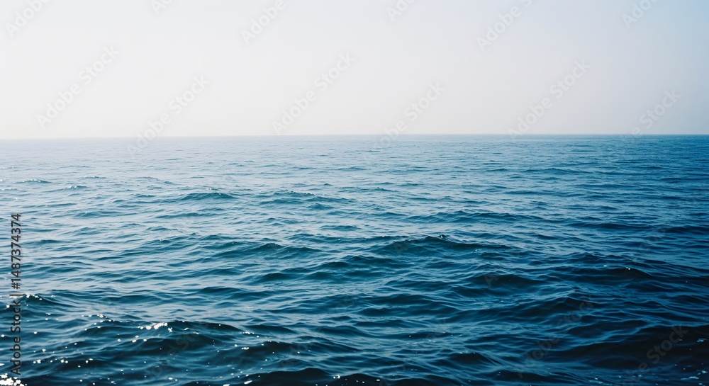 Fototapeta premium Serene Ocean Vista: A Captivating View of the Deep Blue Sea