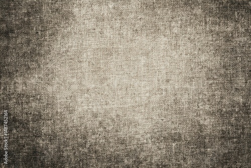 Grunge-textured linen canvas background in neutral tones for artistic and creative endeavors