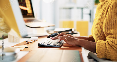 Hands, typing and computer for research, copywriting or editing newsletter at office desk. Person, writer or editor with desktop keyboard for creative website, social media or email for news business