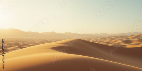 Wallpaper Mural A minimalist desert landscape with undulating dunes, one standing out in soft golden light against a pale blue sky. Torontodigital.ca