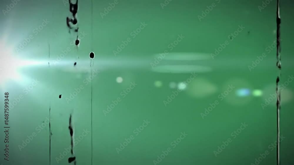 Vintage Film Burn and Shimmering Light Leak – Light Green Screen Overlay for Retro, Cinematic, and Nostalgic Video Projects

