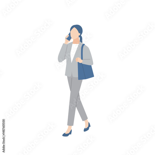 通勤中にスマホで話しているビジネスパーソン