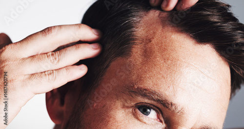 фотографія Hairline, growth and closeup with man in studio for scalp inspection, beauty and alopecia treatment