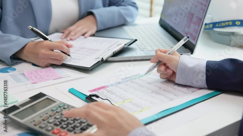 Expert woman asian female people review data number costing managerial account prepare monthly actual cost variance report income tax at audit office. ESG budget control ERP process service project.