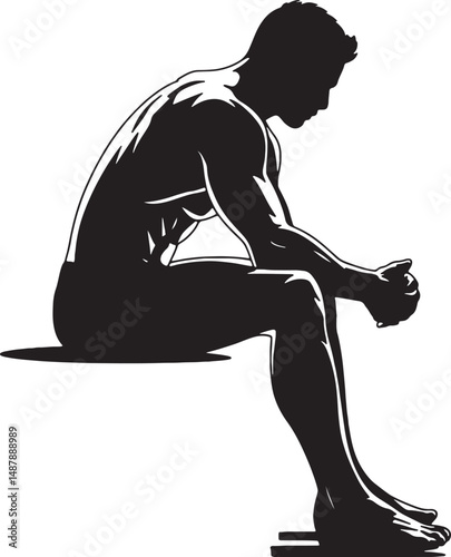 Muscular man sitting pensively silhouette