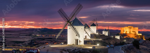 Historic windmills of Consuegra at twilight, Castilla-La Mancha, Spain.