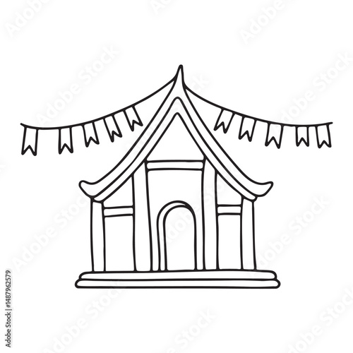 A temple with hanging prayer flags across the roof