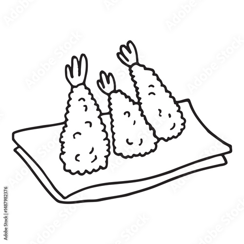 Tempura piece resting on a paper towel in the kitchen