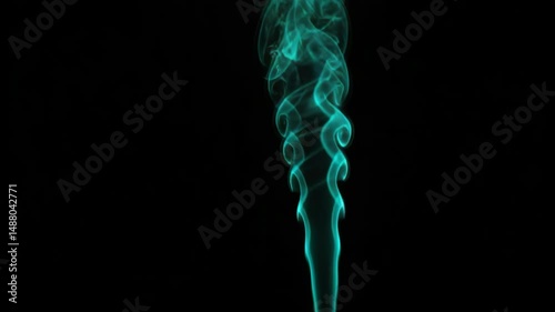 Blue thick smoke clouds billowing in a dense formation against a black background. Ideal for mysterious, atmospheric, and abstract themes. photo