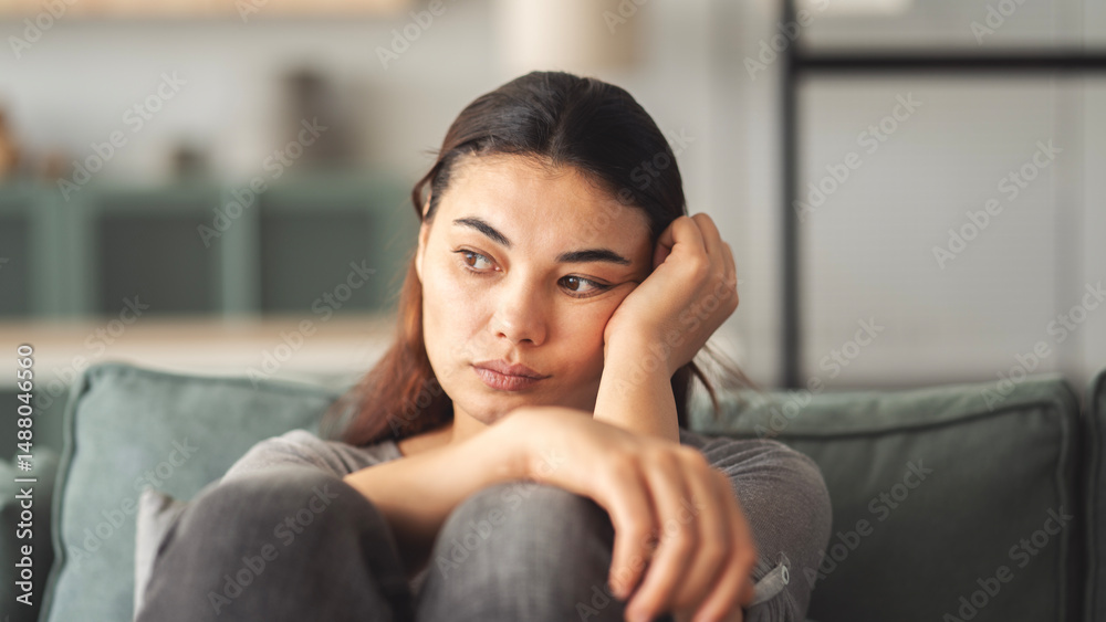 Sad young woman dealing with loss and psychological trauma Sad young woman dealing with loss and psychological trauma
