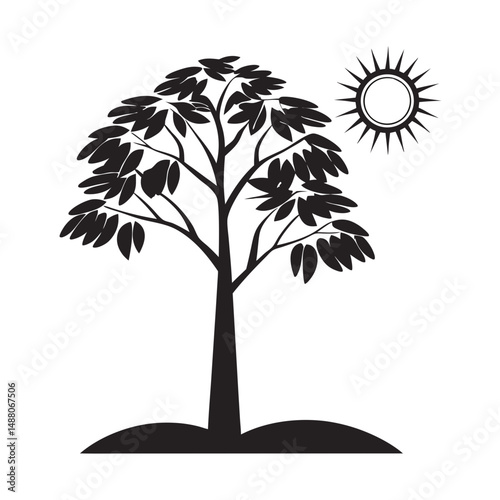 Black silhouette of a tree under a sun 