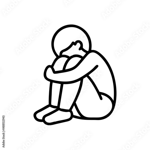 Teen hugging knees while sitting, sadness and isolation, mental health in teenagers