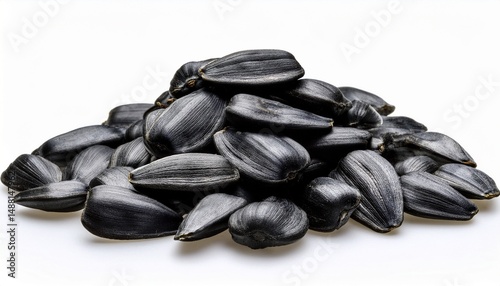 Wallpaper Mural pile of black sunflower seeds on a white background Torontodigital.ca