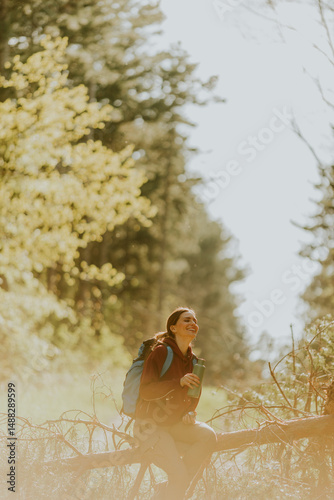 Joyful hiker embraces natur...